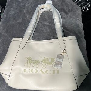 Coach tote bag-brand new with tags. Color is chalk/vanilla